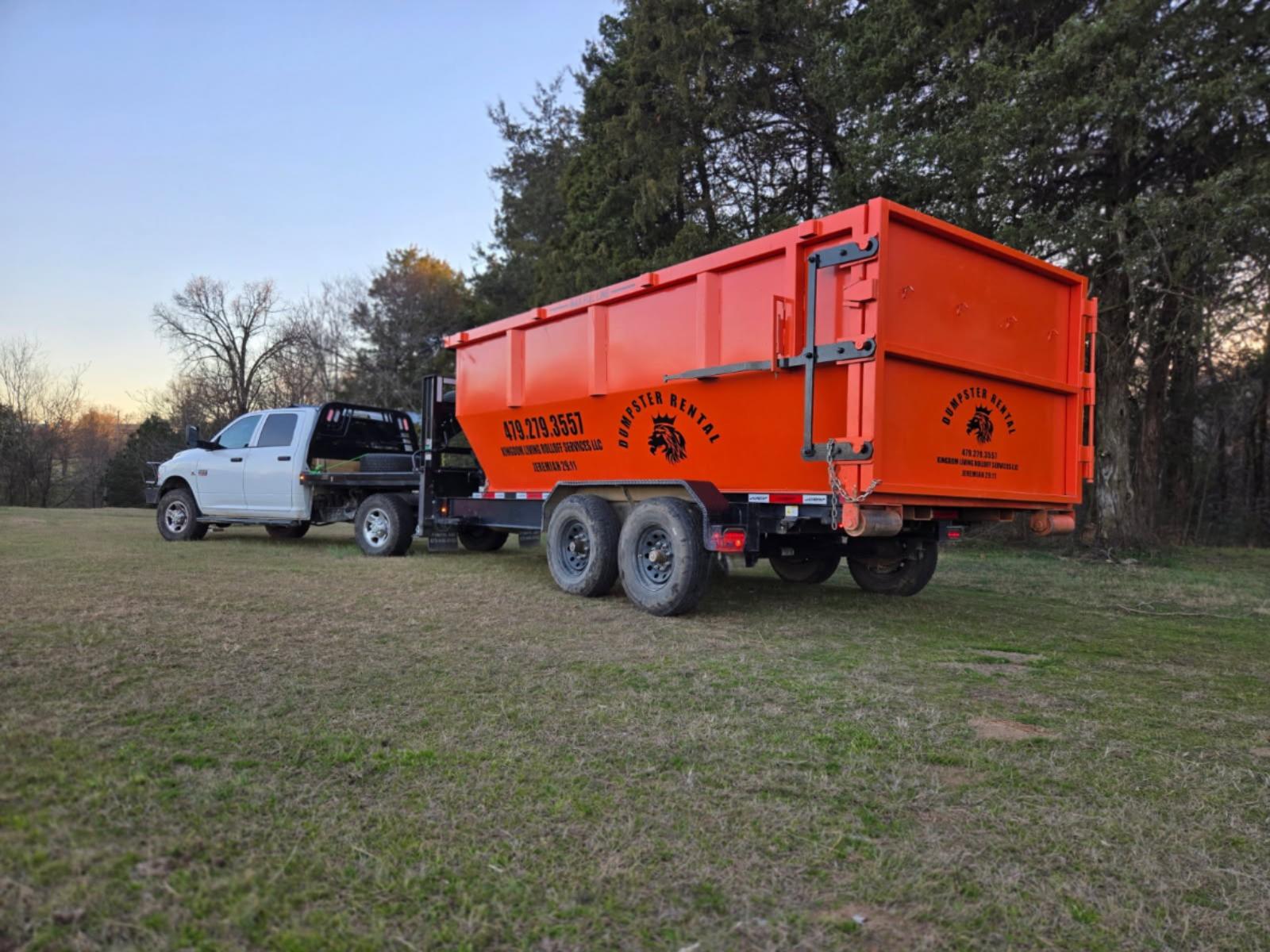 Kingdom Living Rolloff Services dumpster delivery in progress in Van Buren AR