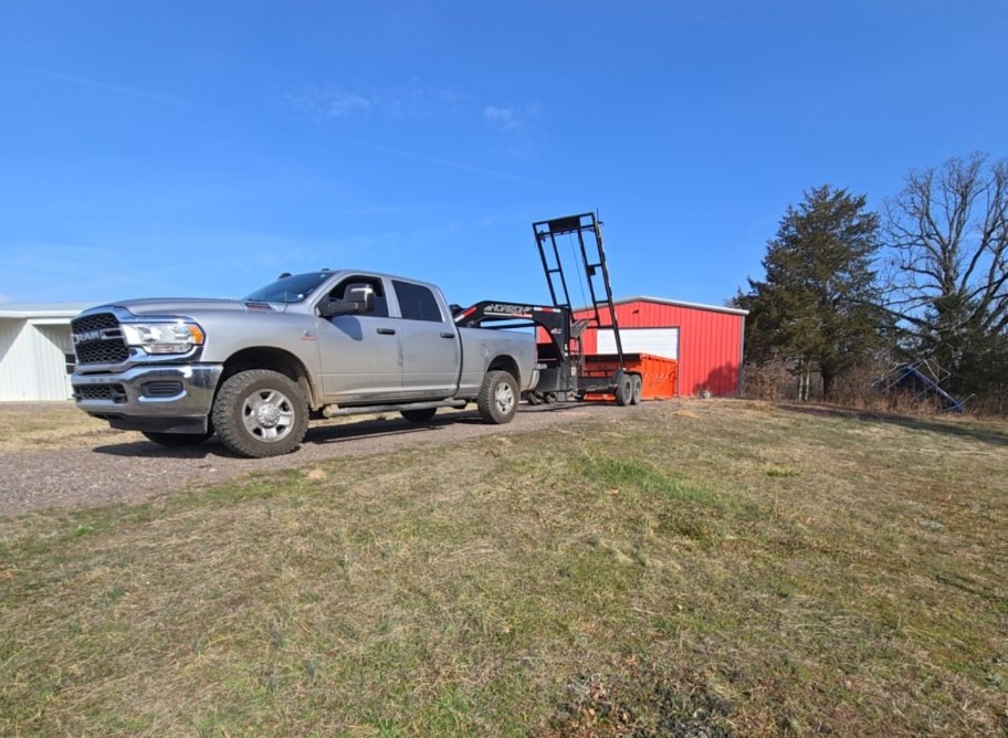 Construction dumpster rental on job site in Sebastion County AR — Kingdom Living Rolloff Services